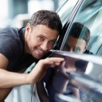 man checking side of car - we also offer other services